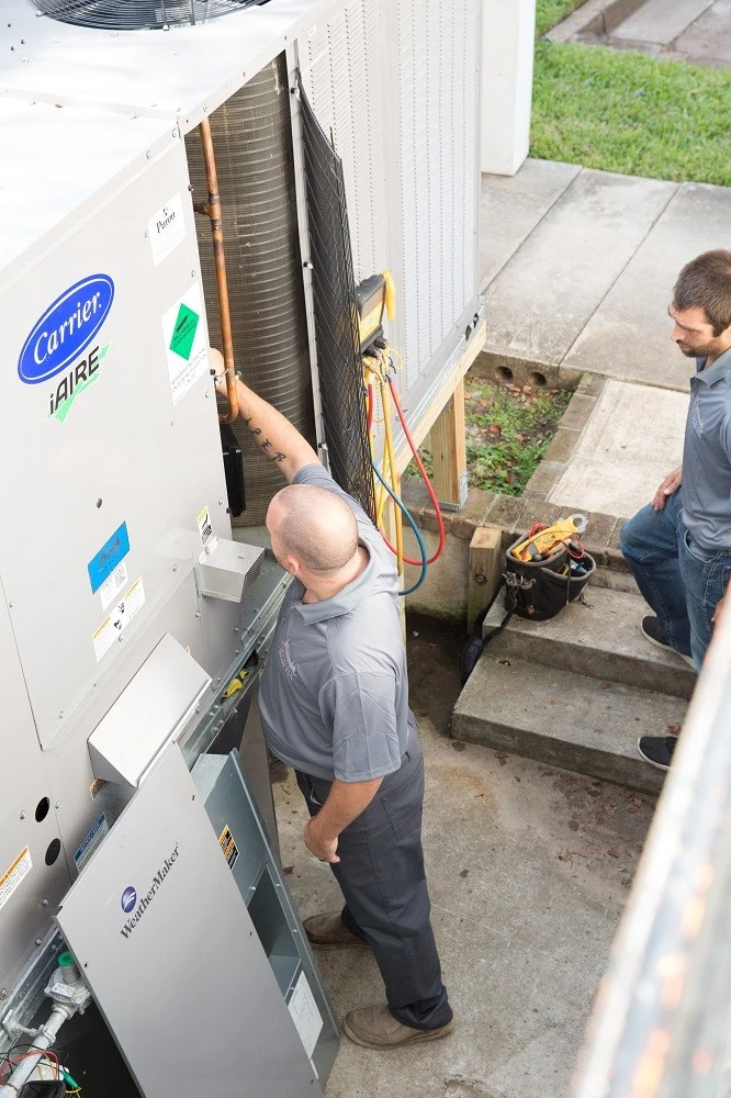 Holy City technician completing an air conditioning installation