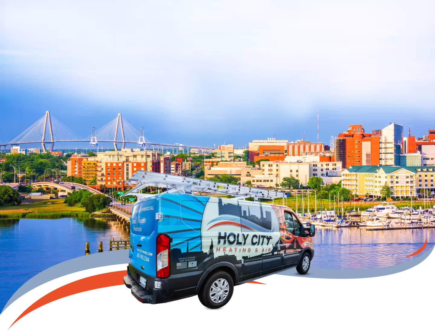 A wrapped Holy City Heating & Air van in front of the Charleston skyline and Ravenel Bridge